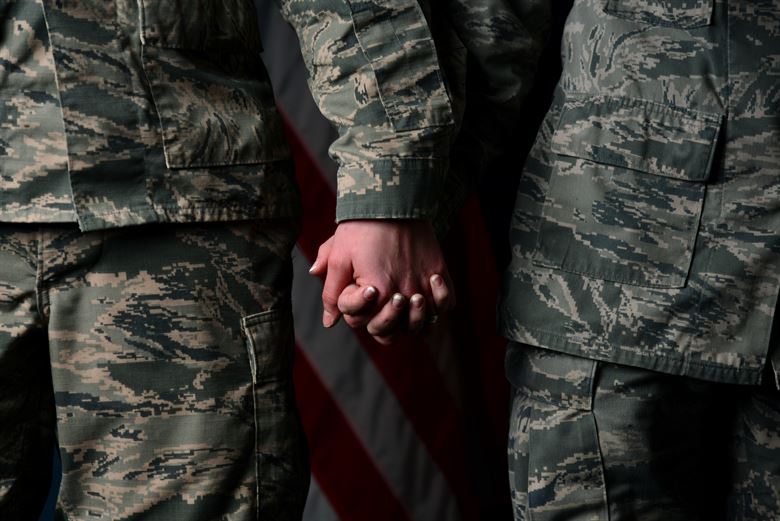 Couple holding hands