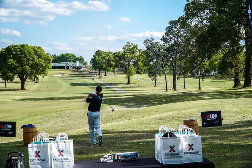 golfer teeing off at Fort Jackson Golf Club