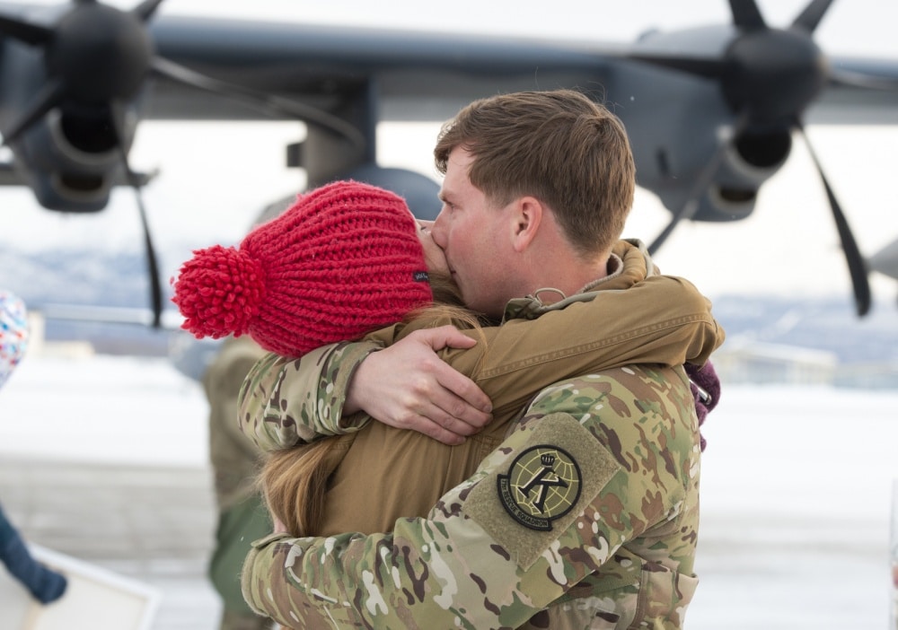 Air National Guard Captain embraces his wife
