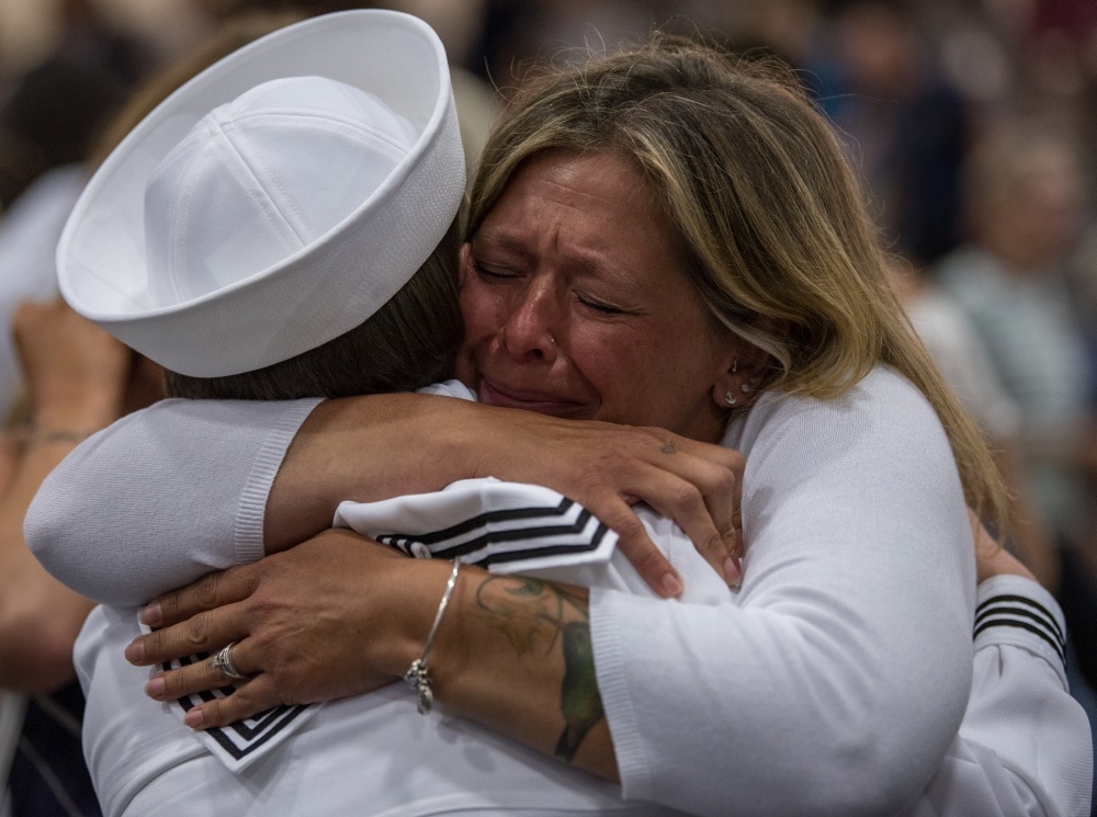 mom embraces sailor