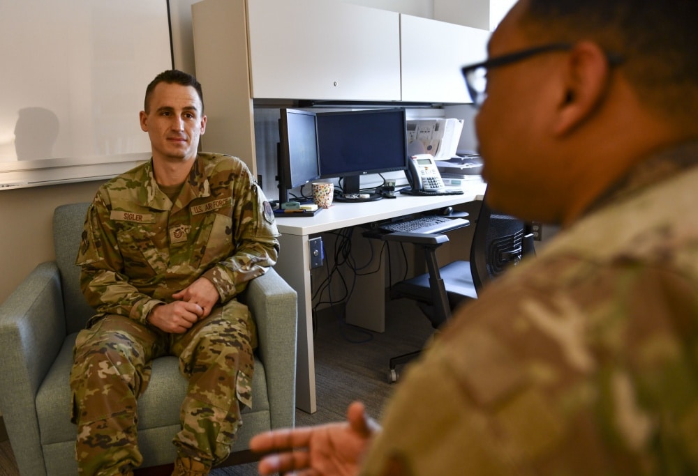 mental health flight chief talks with patient