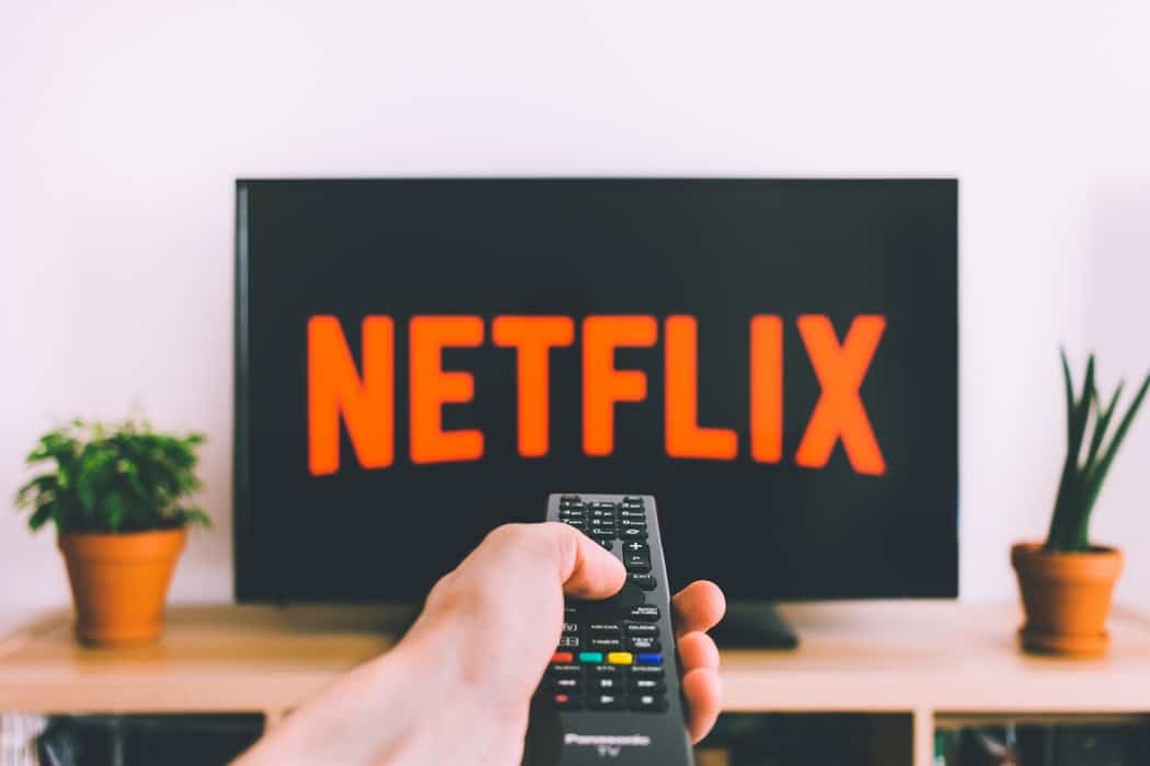 remote pointed at netflix on tv