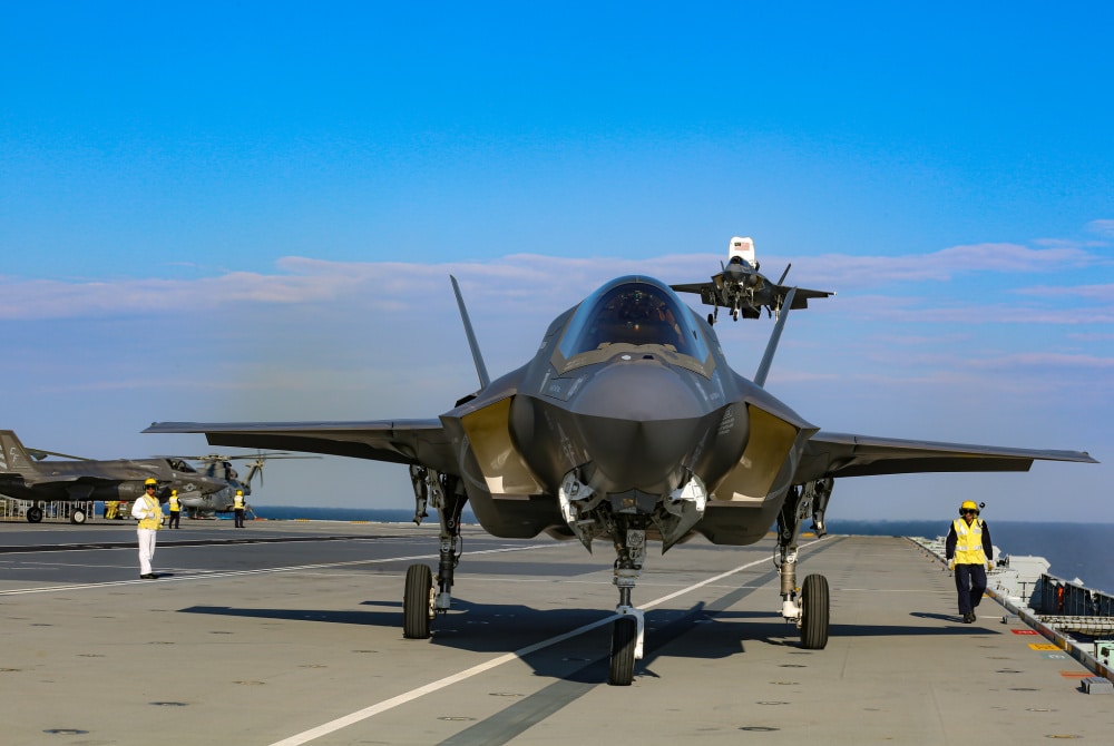 Marines with Marine Fighter Attack Squadron (VMFA) 211, Carrier Strike Group (CSG) 21 “The Wake Island Avengers” conduct carrier qualifications in F-35 jets aboard Her Majesty’s Ship (HMS) Queen Elizabeth at sea off the coast of the United Kingdom (UK) on 02 May, 2021 (1st Lt. Zachary Bodner).