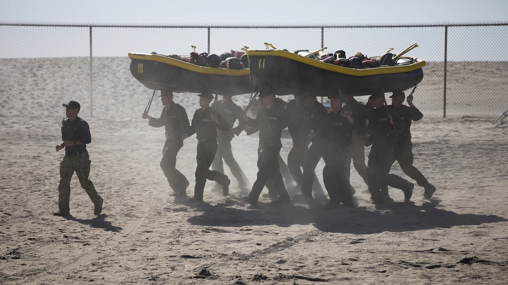 Navy SEALs BUD/S carrying boats