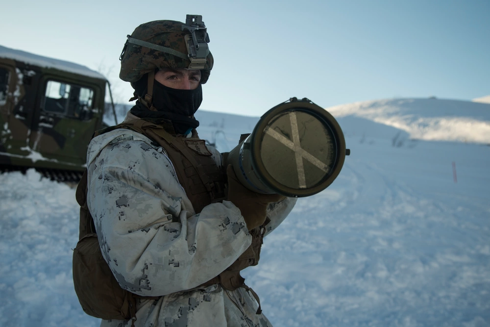 Marine carrying TOW missile
