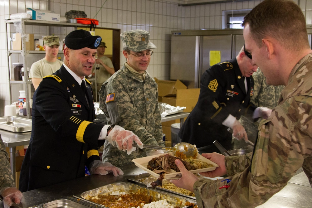 General Christopher Cavoli serves Thanksgiving dinner in Grafenwoehr, Germany