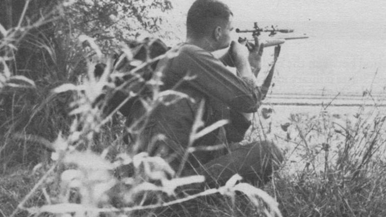 Marine aims Winchester Model 70 in Vietnam