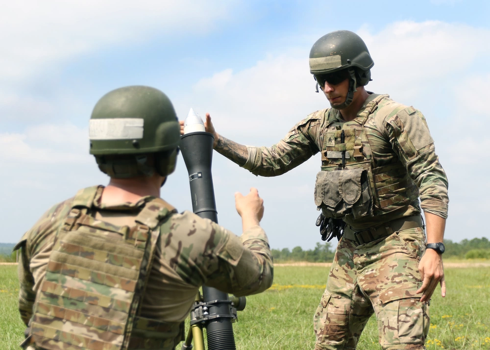 special forces fire a mortar during a Special Forces Weapons Sergeant Course