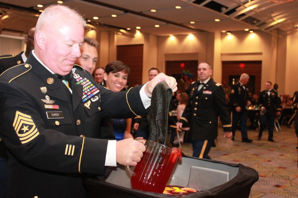 sock being lifted from grog bowl