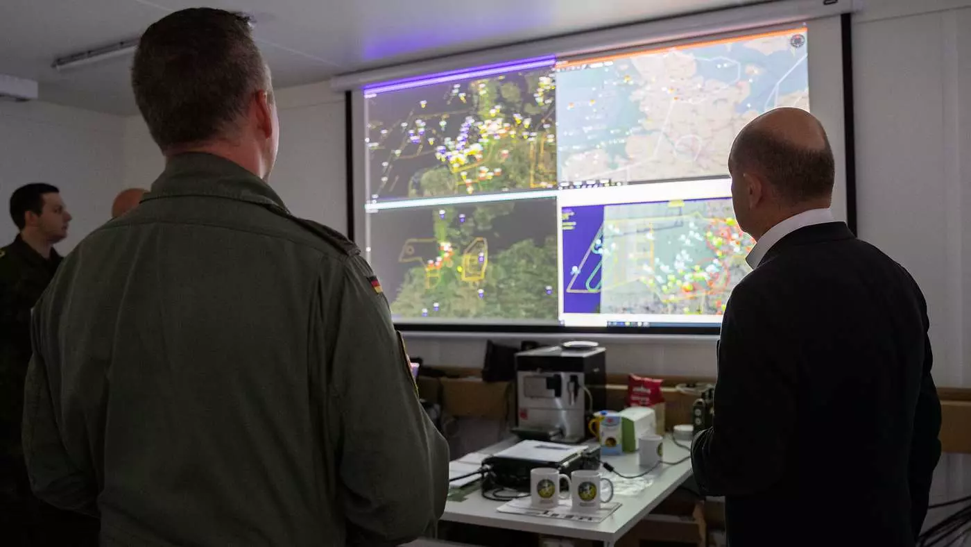 German Chancellor Olaf Scholtz attends a briefing on Air Defender