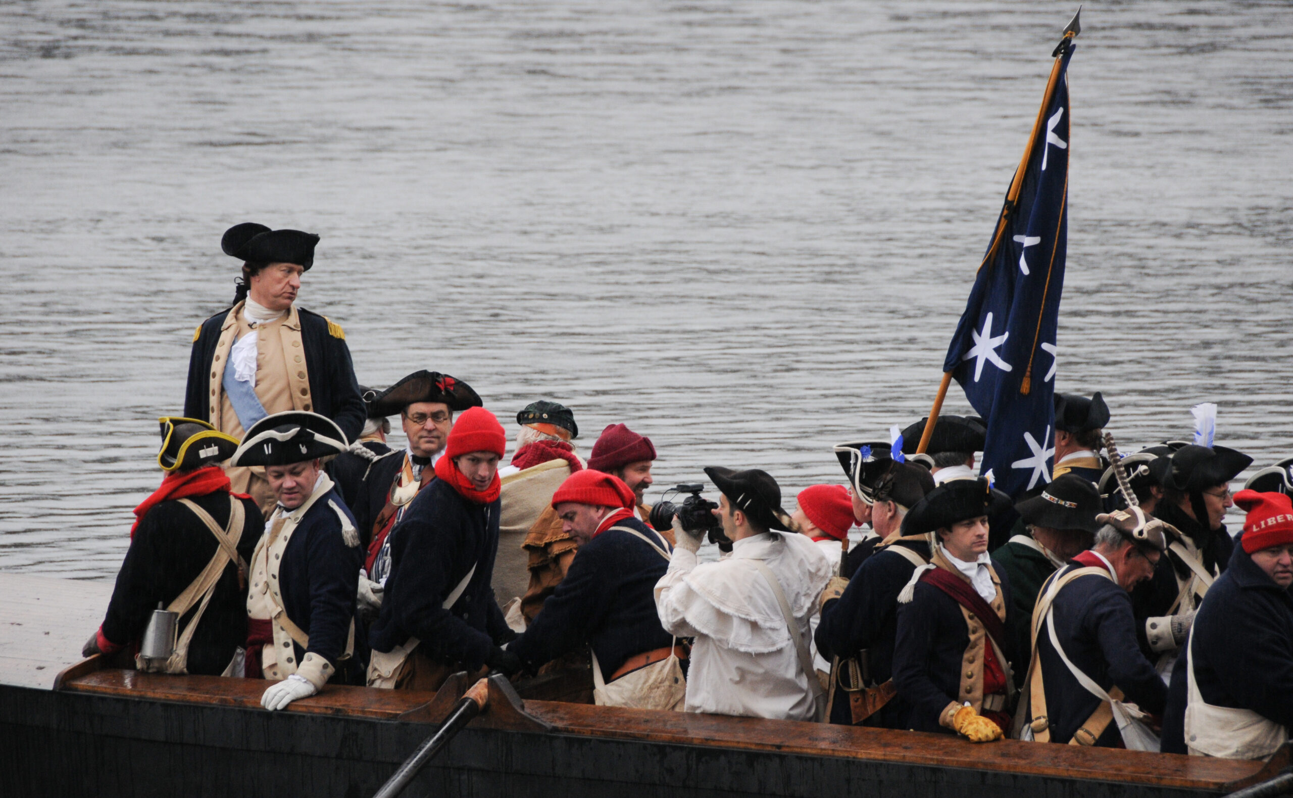 Members of the Washington Crossing Re-enactors Society portray Gen. George Washington and his troops during a Dec. 9 dress rehearsal for the 60th Annual Crossing of the Delaware re-enactment scheduled for Christmas day at Washington Crossing Historic Park, Pa. Each December, thousands of people gather on the New Jersey and Pennsylvania banks of the Delaware River to watch the re-enactment of George Washington's 1776 river crossing during the American Revolution.