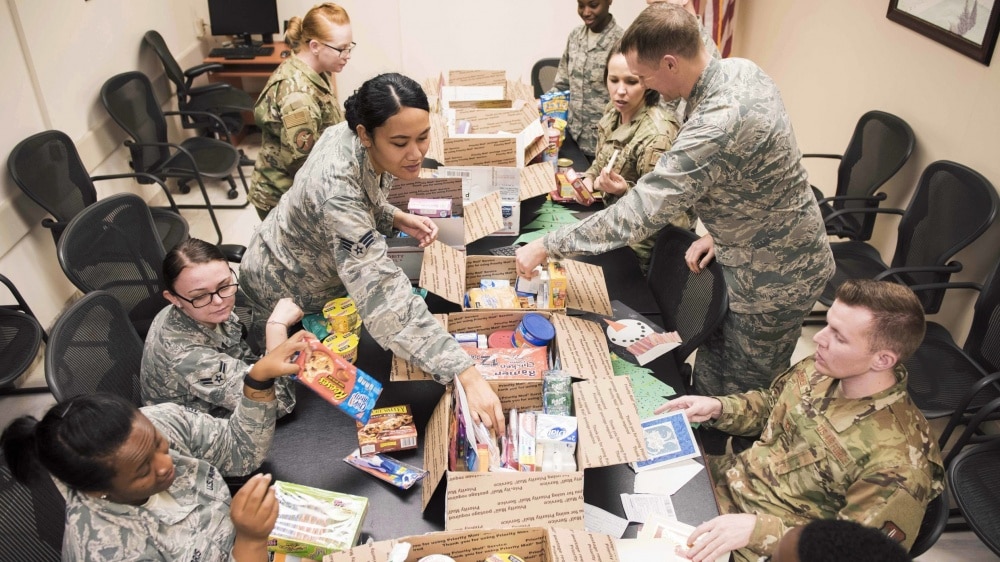care packages for troops being opened