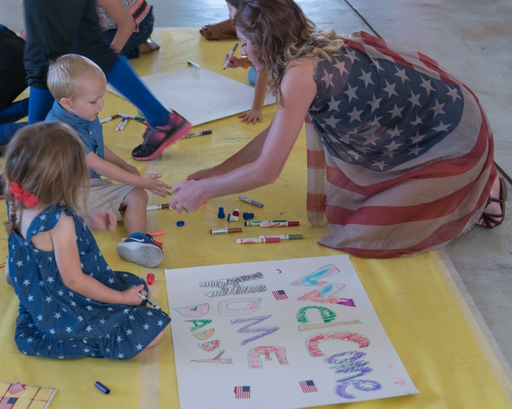 activities for kids at home: making welcome home signs