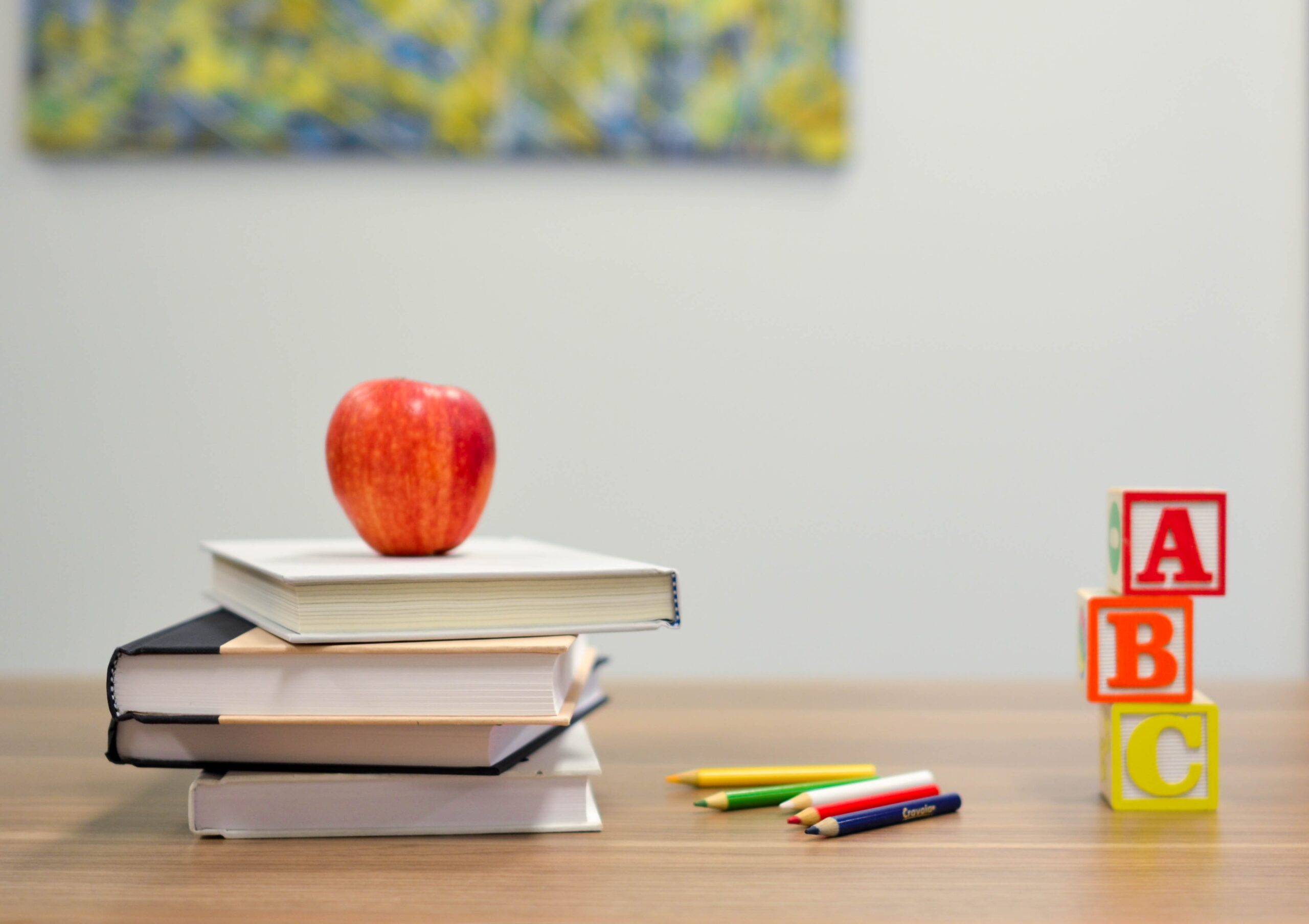 teach at home: stack of books and abc blocks