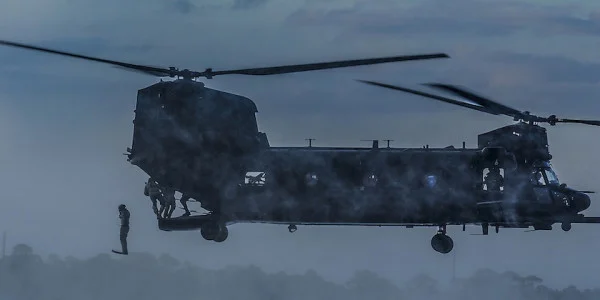 airmen jump from MH-47 Chinook 