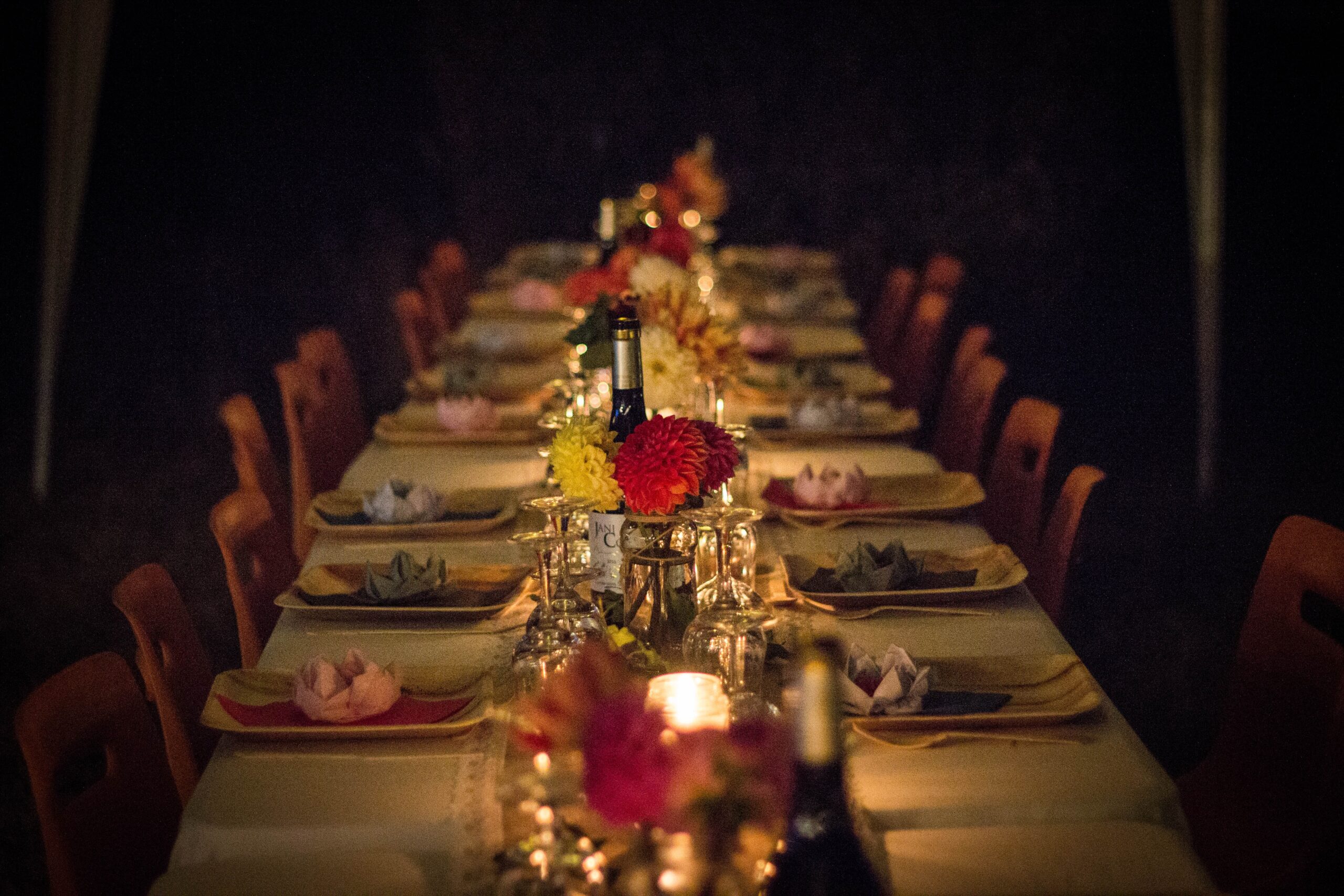 welcome home idea dinner party set up at long empty table