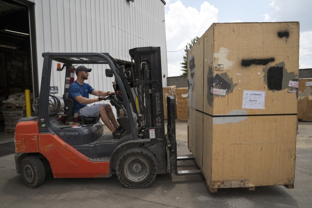 moving company transports household goods on a forklift