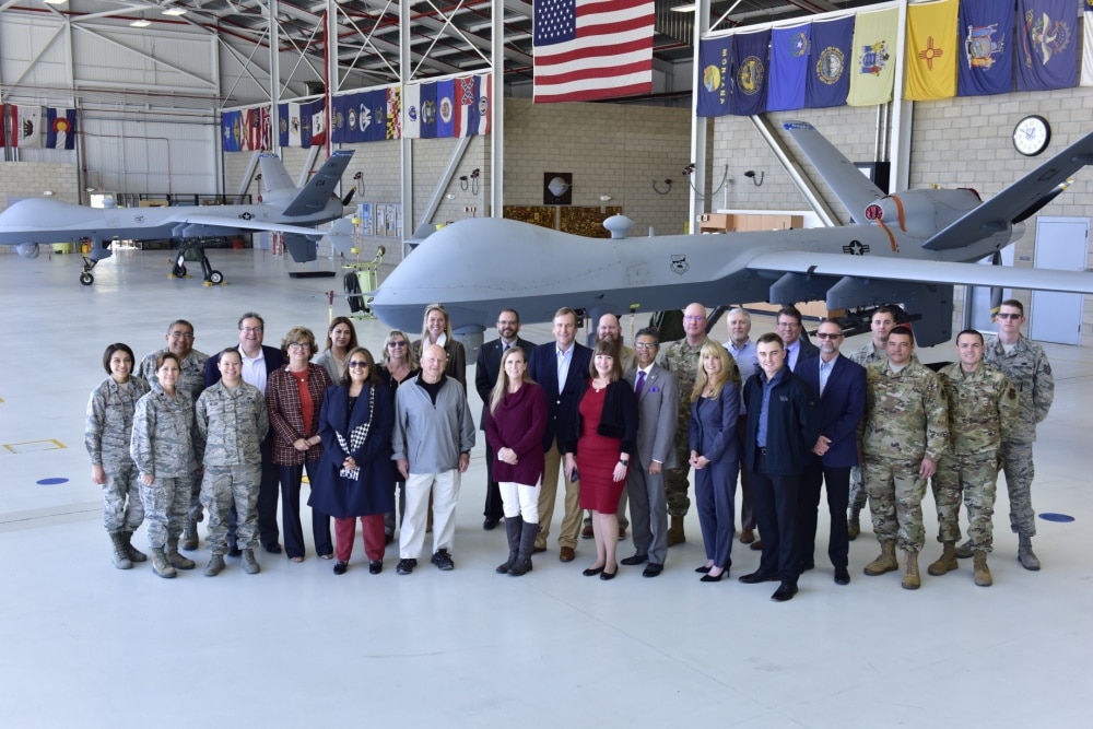 base tour group posing for picture