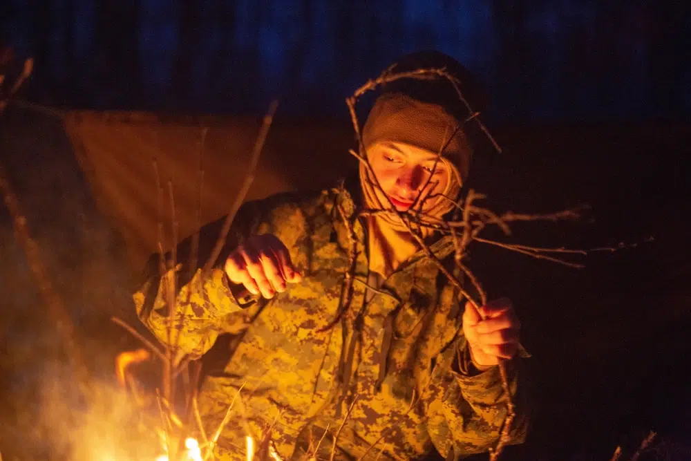 Marine lighting a fire