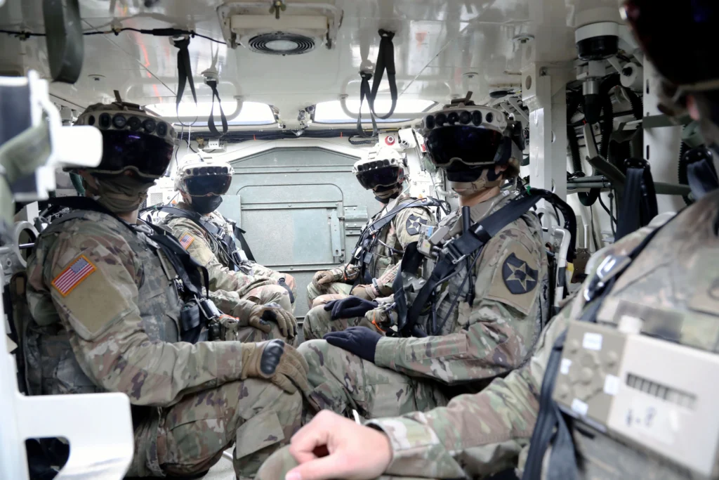 Soldiers wearing IVAS goggles in a Stryker vehicle