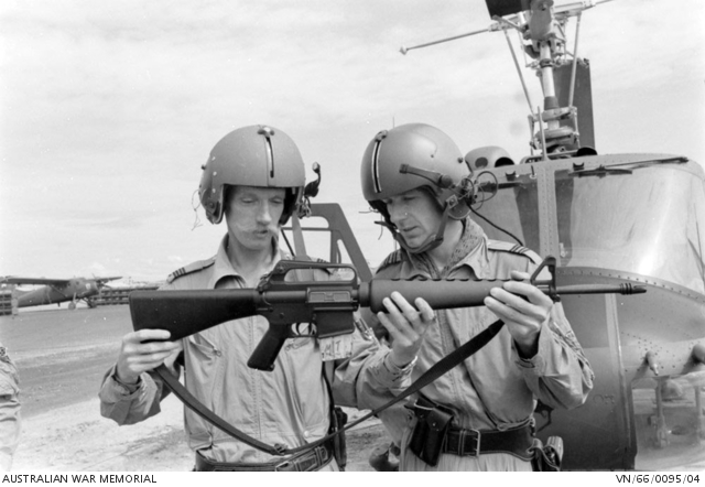 Pilots examine newly issued M16