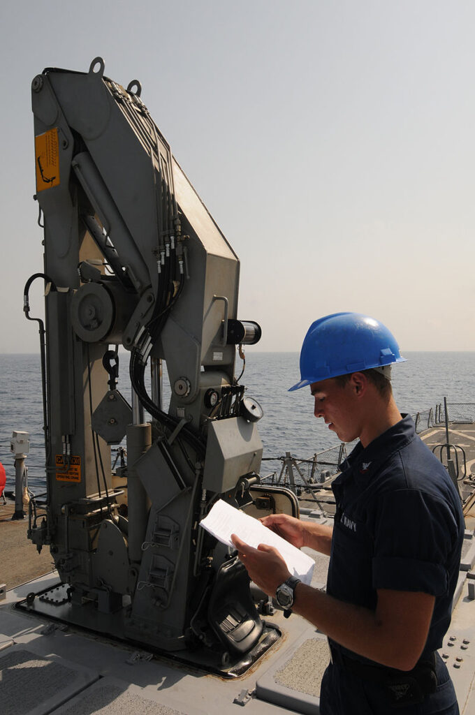 U.S. Navy maintenance check on USS Mitscher