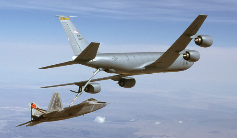 KC-135 refuels F-22