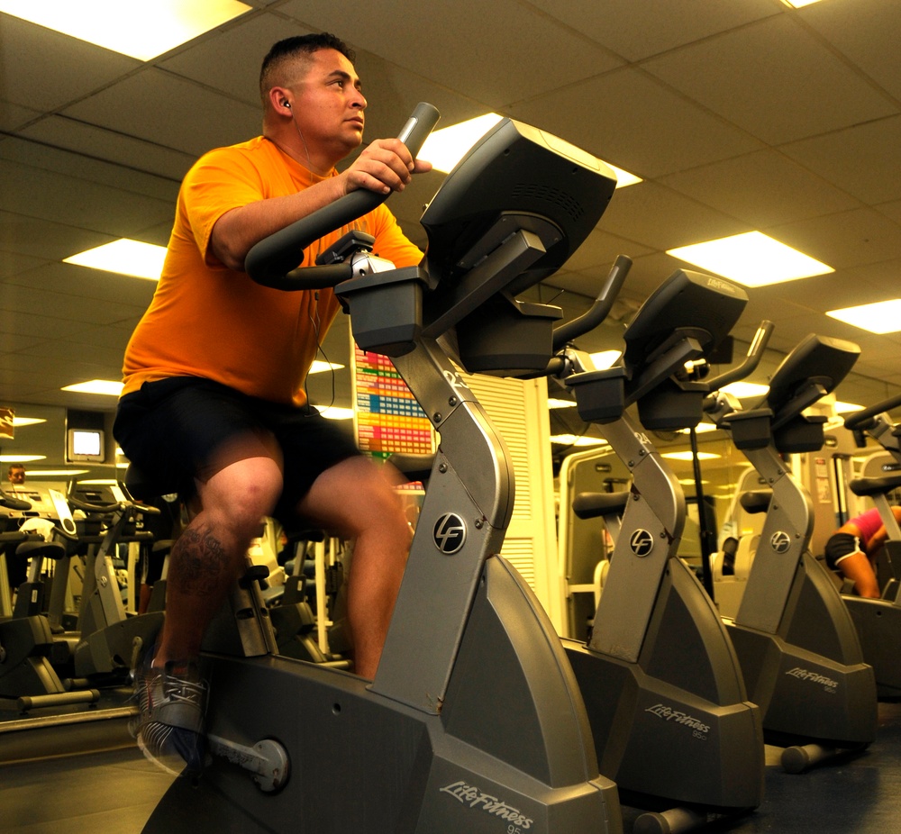 sailor training on stationary bike