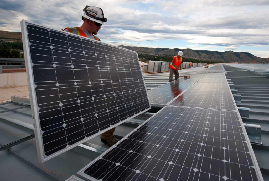 Installing PV panels on the roof at the Research Support Facility, RSF