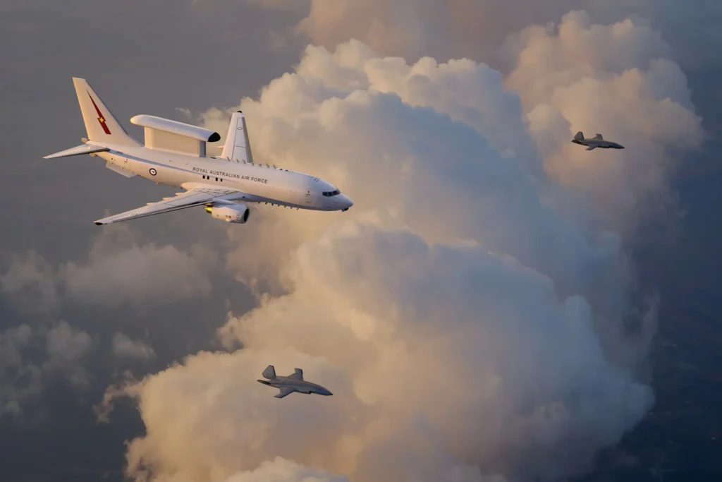 Two MQ-28 Ghost Bats and an E-7A Wedgetail