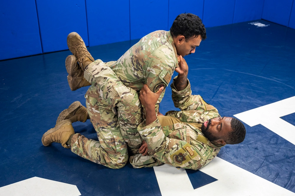military Phoenix Raven team members demonstrate Judo technique