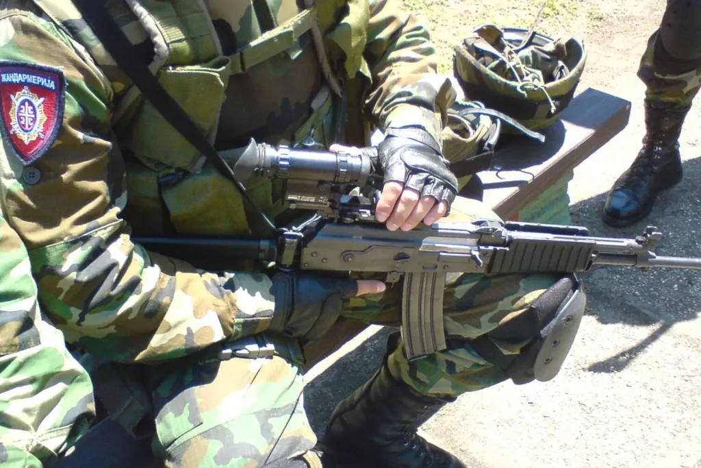 Serbian gendarme holding a Serbian M21 Zastava rifle