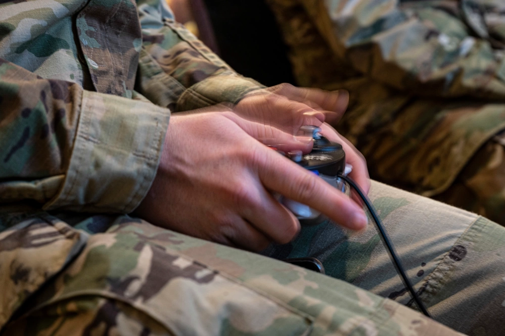 soldier plays videogame