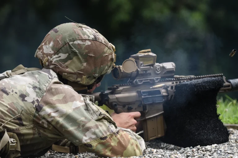 Soldier fires M7 rifle