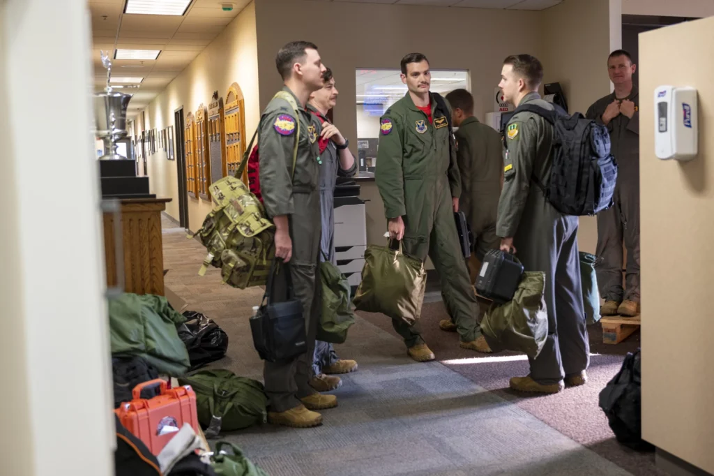 Airmen wait for bus to flight line Barksdale Air Force Base