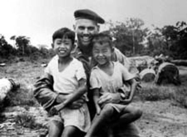 Captain Rocky Versace with Vietnamese children
