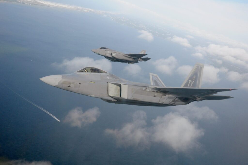 F-22 and F-35 fly over Emerald Coast