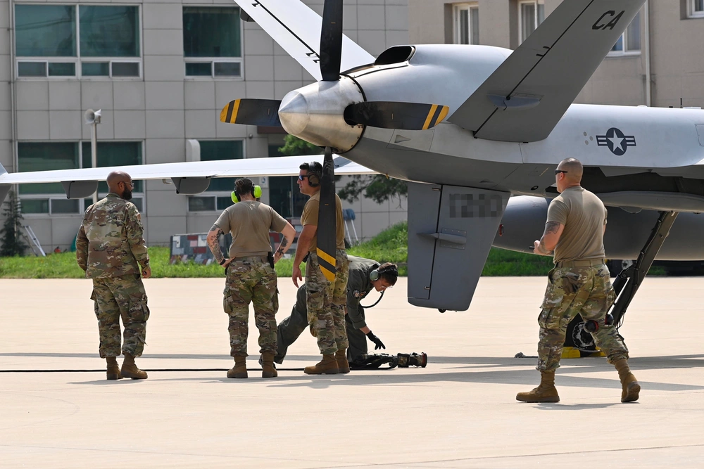 MQ-9 drone refueling Marines
