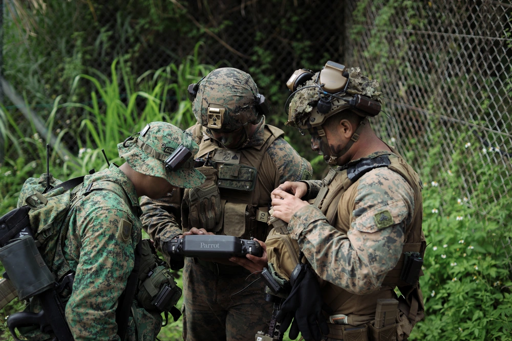 Marines and Singaporean troops conduct drone operation