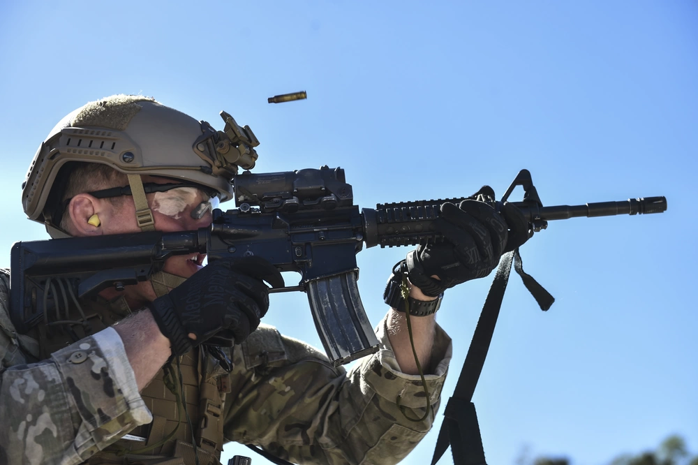 Air Force special operator fires M4 rifle