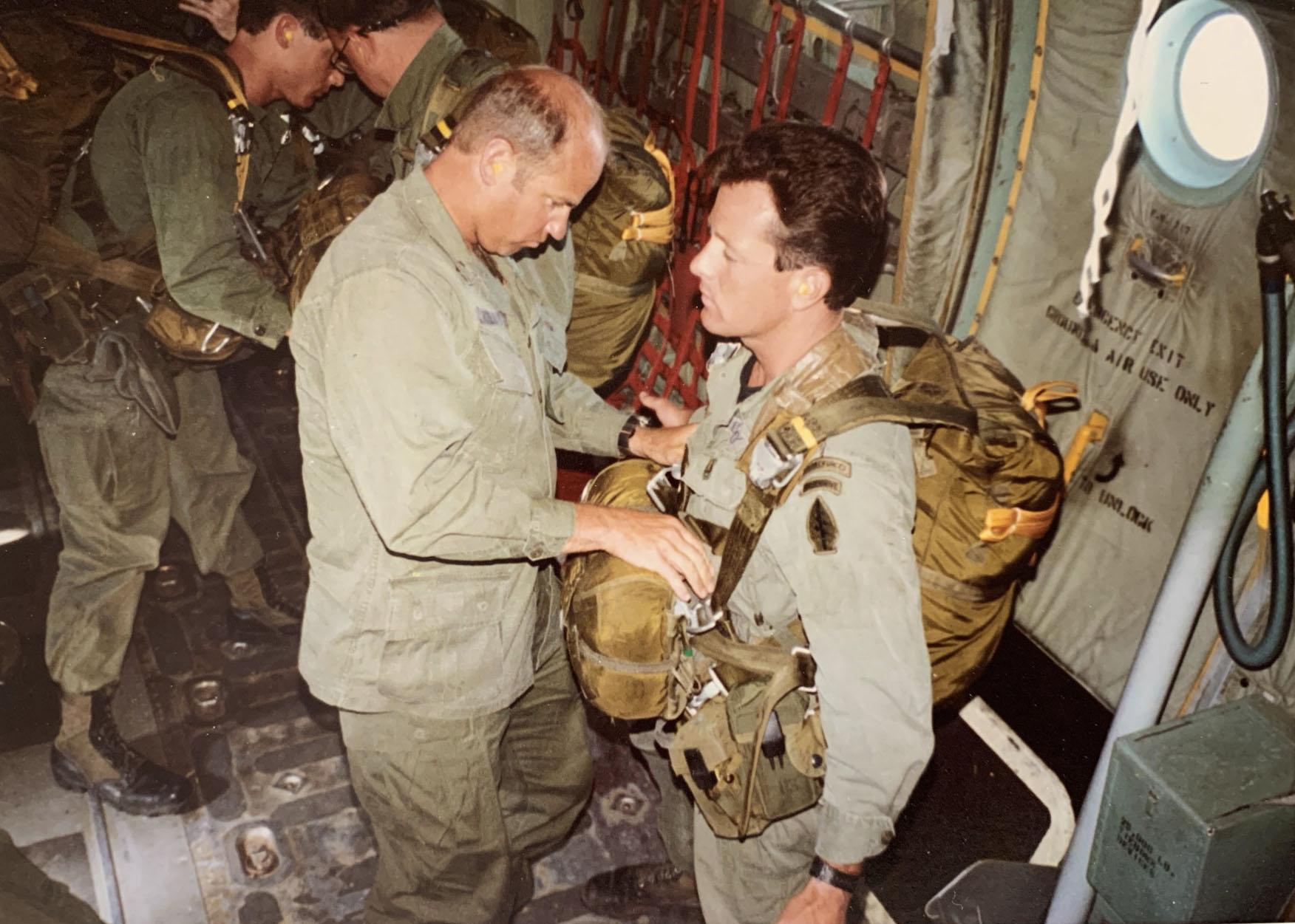 George Hand getting ready to perform static line parachute jump