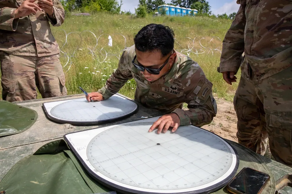 plotting fire direction data mortar exercise Army