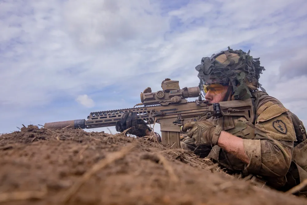 Soldier using M7 rifle