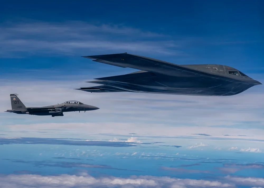 B-2 and F-15 during live-fire sinking exercise