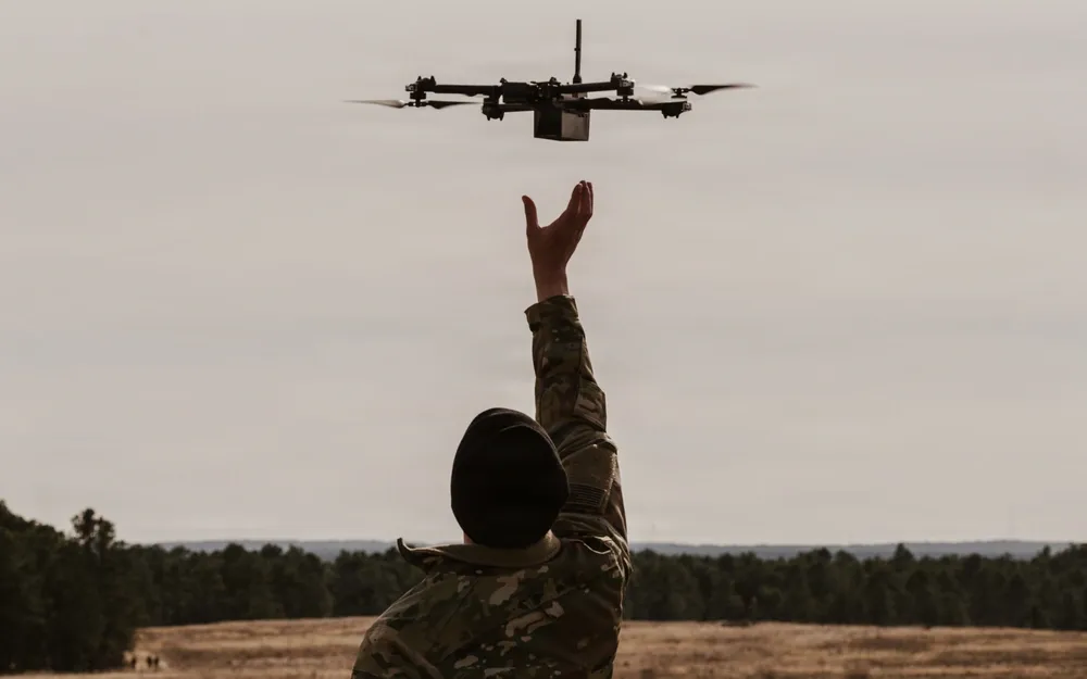 paratrooper releases drone